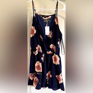 Lydelle Boutique romper. Navy with flowers. NWT size L